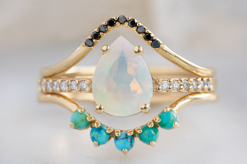 The Willow Ring with a Pear-Cut Opal With Stacking Bands