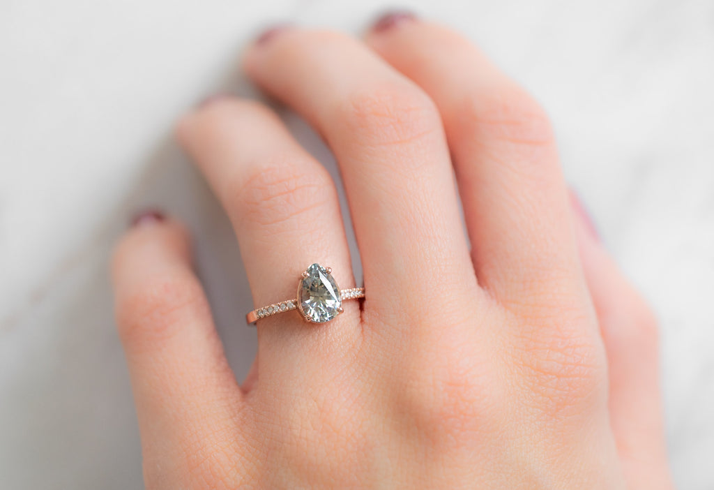 The Willow Ring with a Pear Cut Sapphire on Model