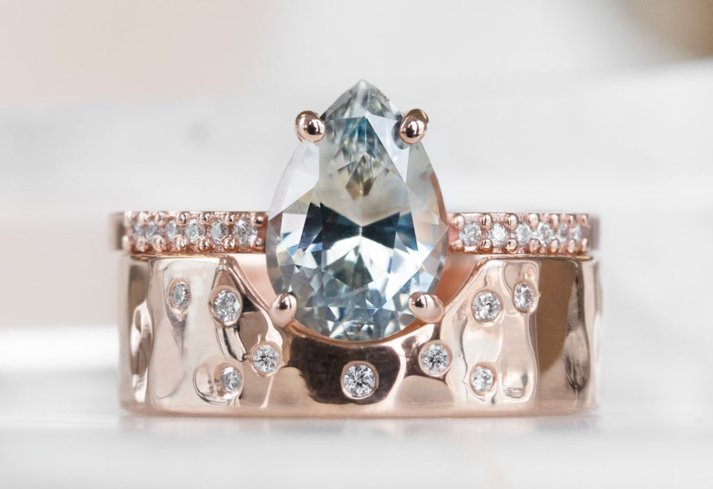 The Willow Ring with a Pear Cut Sapphire with Stacking Band