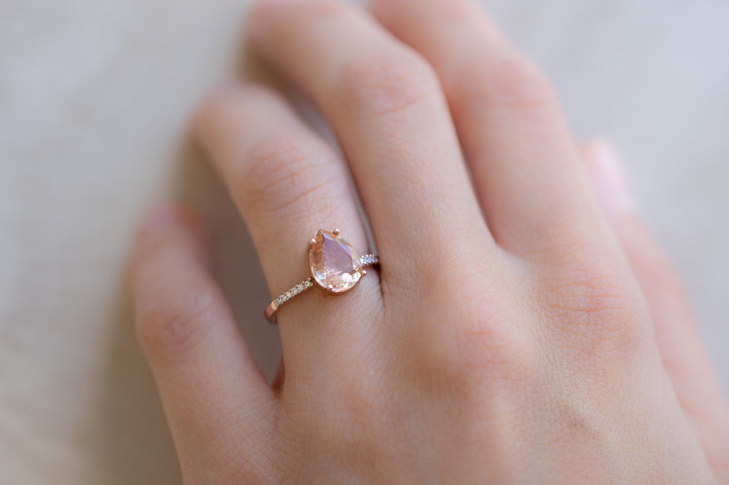 The Willow Ring with a Pear-Cut Sunstone on Model