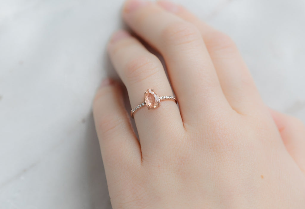 The Willow Ring with a Pear-Cut Sunstone on Model