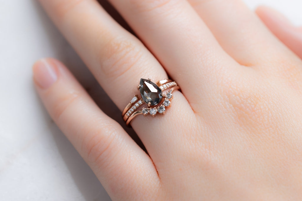 The Willow Ring with a Rose-Cut Black Diamond with Stacking Band on Model