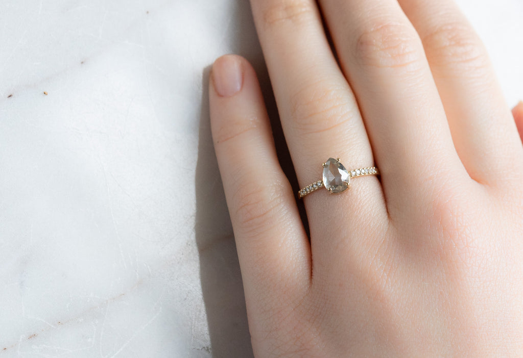 The Willow Ring with a Rose-Cut Green Diamond on Model