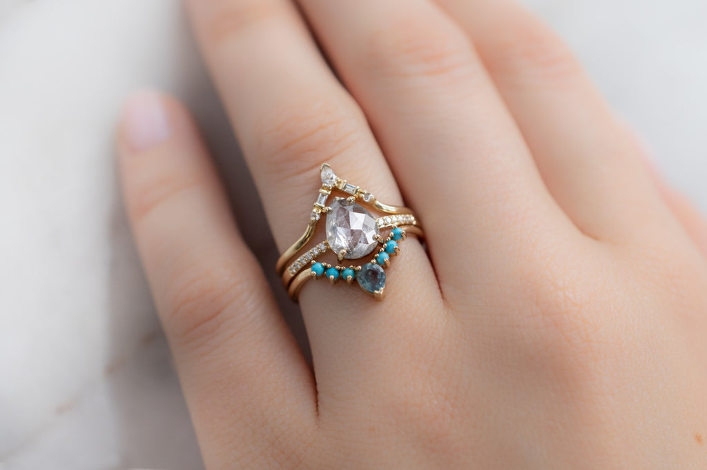The Willow Ring with a Rose-Cut Icy-White Diamond with Stacking Bands on Model