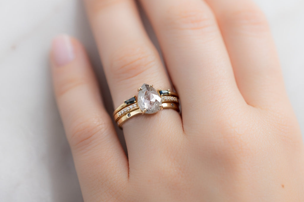 The Willow Ring with a Rose-Cut Icy-White Diamond with Stacking Bands on Model