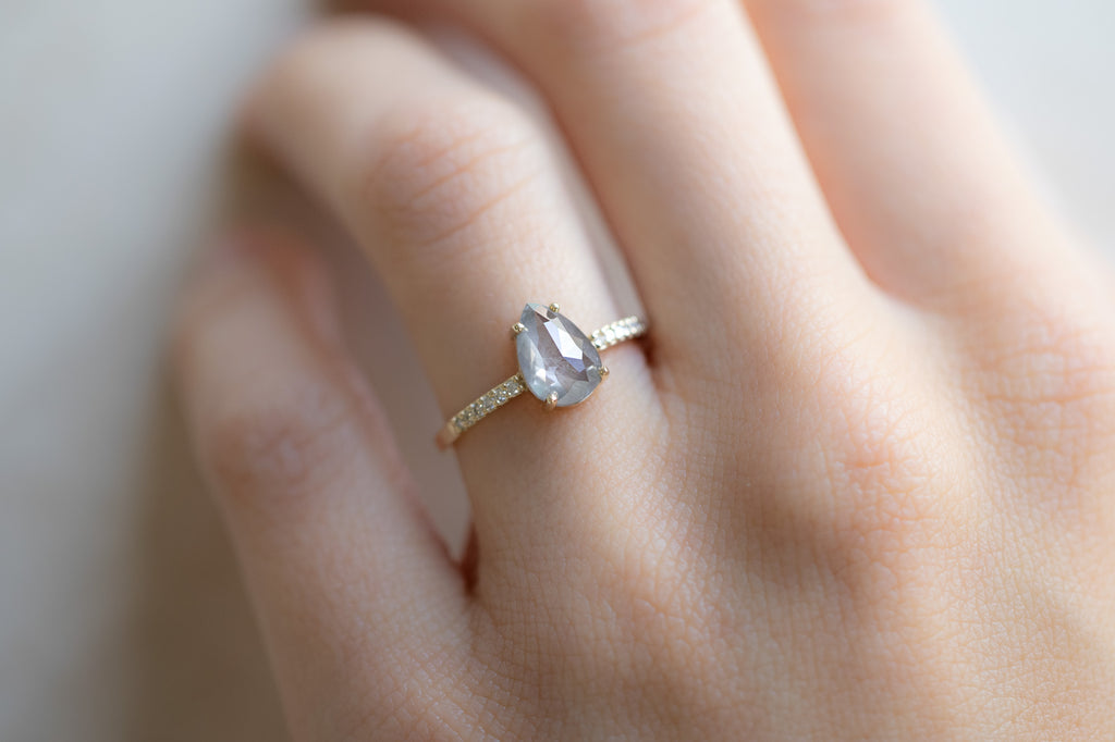 The Willow Ring with a Rose-Cut Opalescent Grey Diamond on Model
