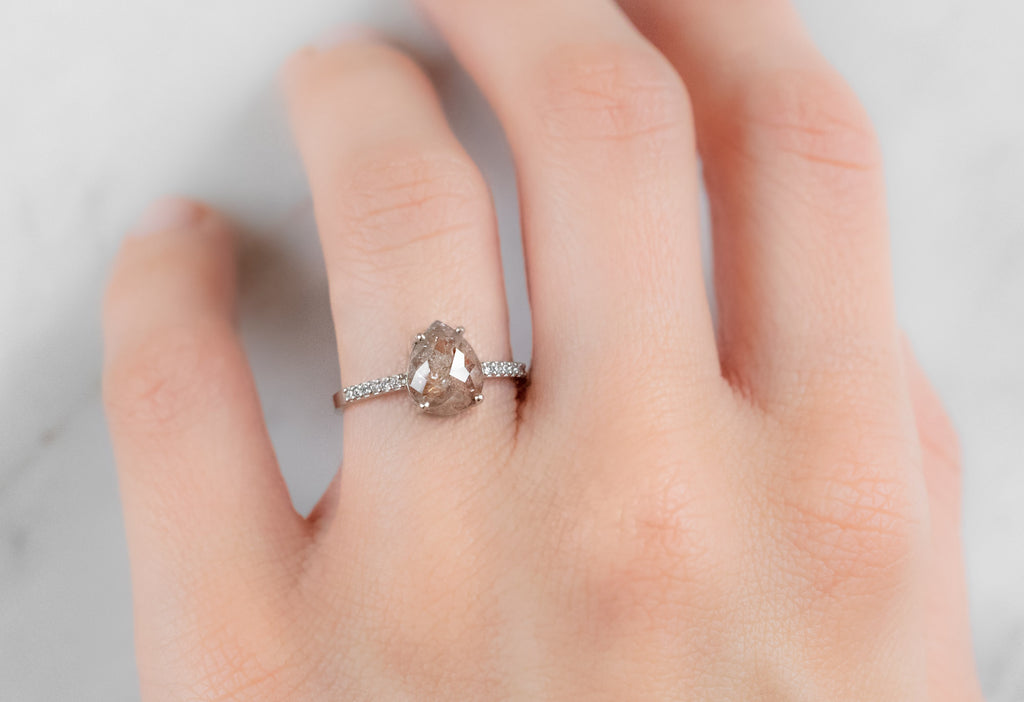 The Willow Ring with a Rose-Cut Red Diamond on Model