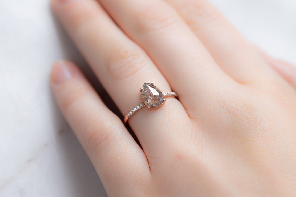 The Willow Ring with a Rose-Cut Red Diamond on Model