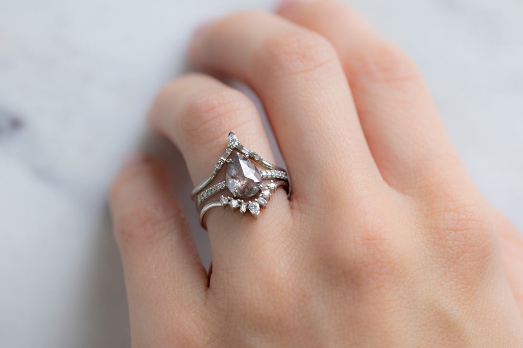 The Willow Ring with a Rose-Cut Red Diamond with Stacking Bands on Model