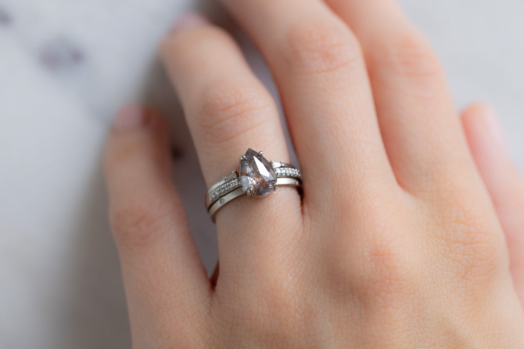 The Willow Ring with a Rose-Cut Red Diamond with Stacking Bands on Model