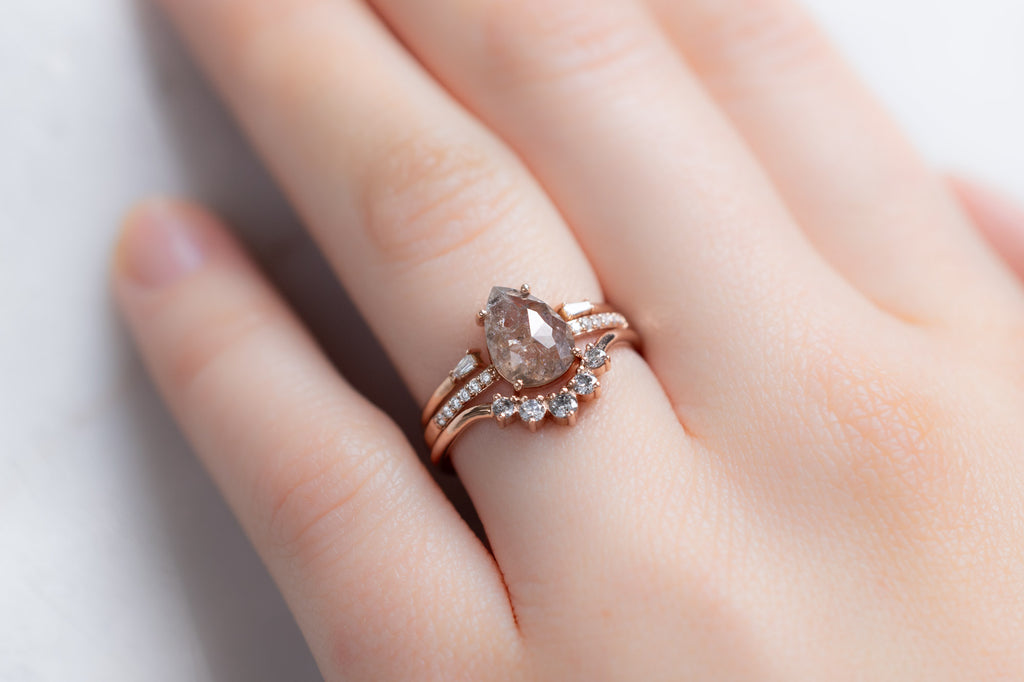 The Willow Ring with a Rose-Cut Red Diamond with Stacking Bands on Model