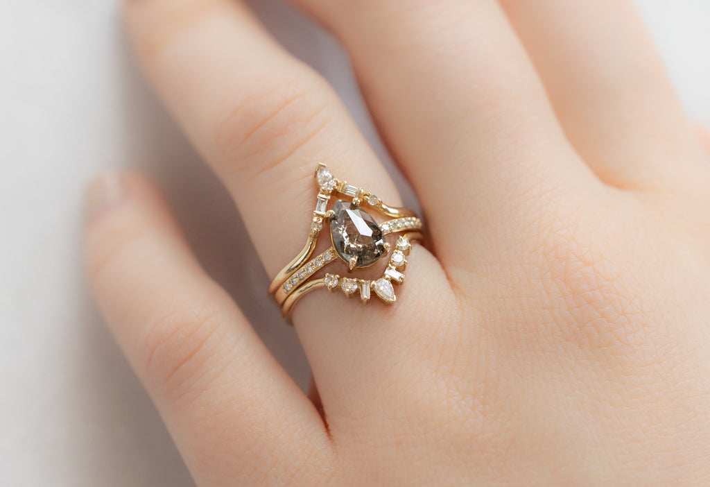 The Willow Ring with a Rose-Cut Salt and Pepper Diamond with White Diamond Stacking Bands on Model