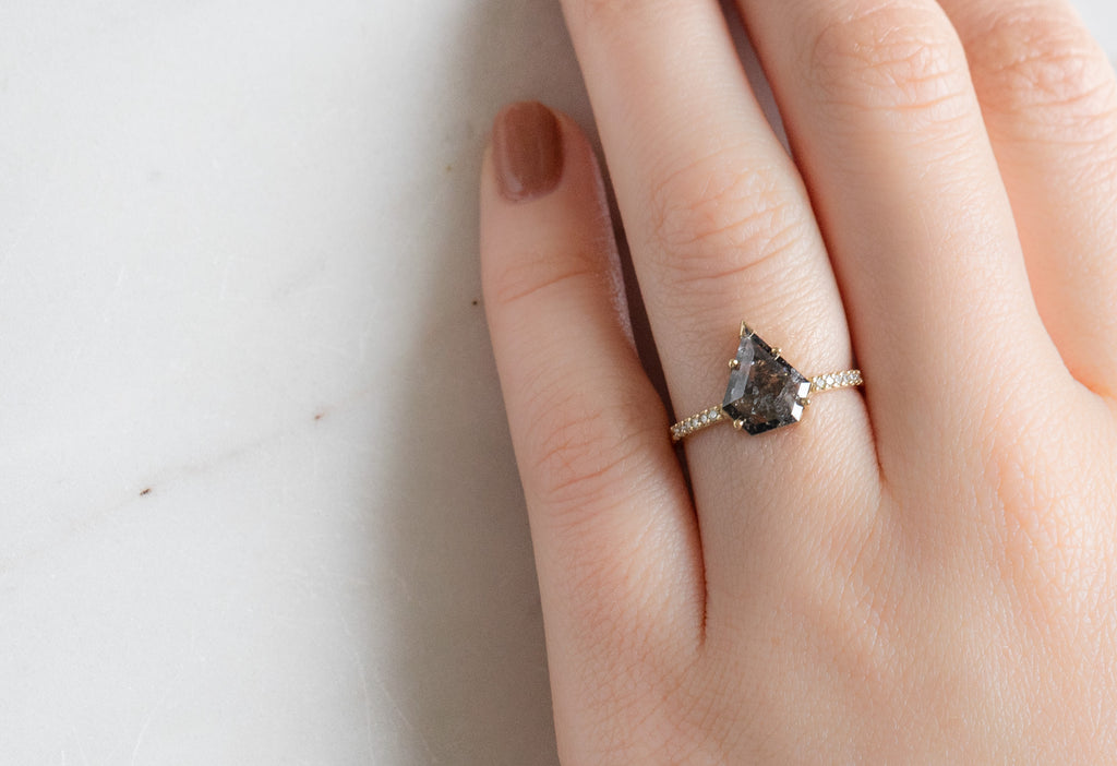 The Willow Ring with a Shield-Cut Black Diamond on Model