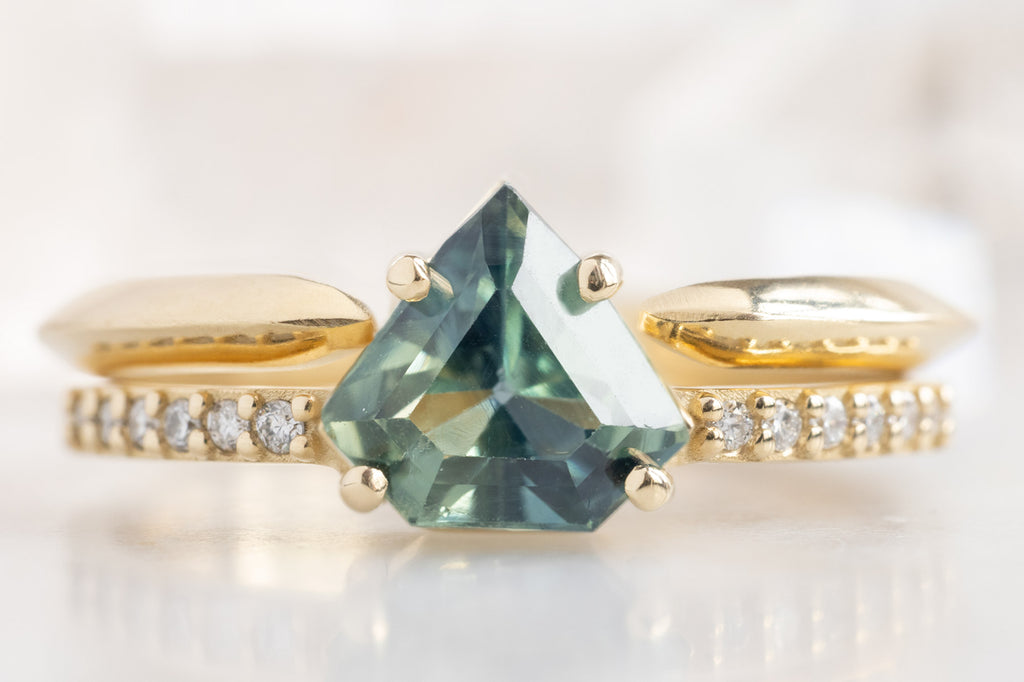 The Willow Ring with a Shield-Cut Montana Sapphire with Stacking Band