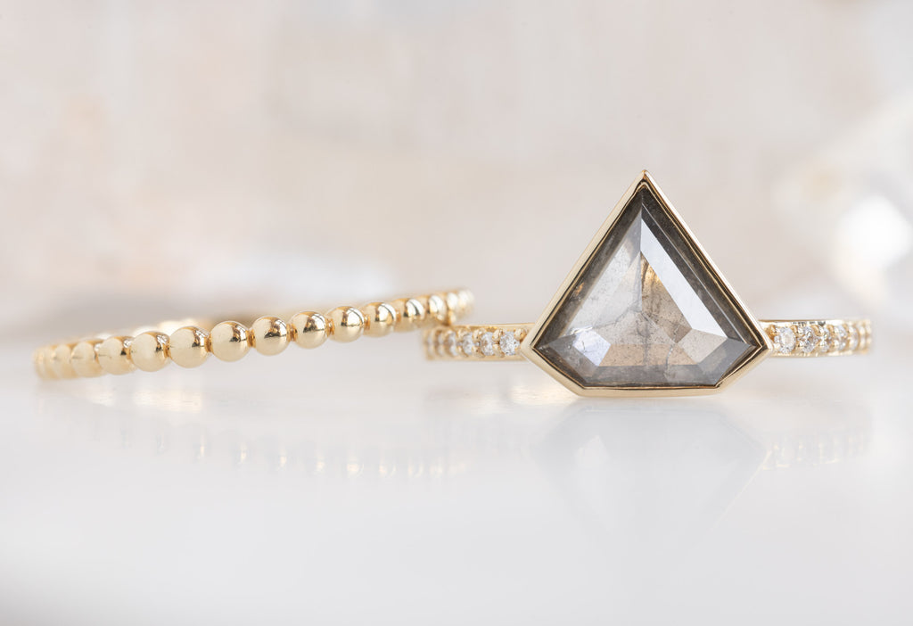 The Willow Ring with a Shield-Cut Salt and Pepper Diamond with Beaded Stacking Band