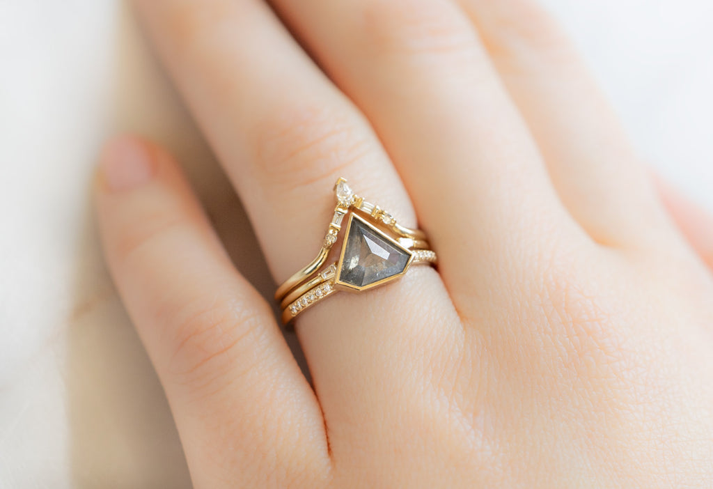 The Willow Ring with a Shield-Cut Salt and Pepper Diamond with White Diamond Stacking Bands on Model