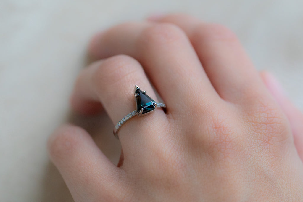 The Willow Ring with a Shield Cut Sapphire on Model