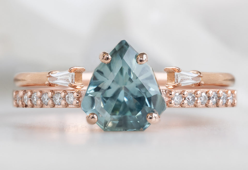 The Willow Ring with a Shield-Cut Sapphire with Open Cuff Baguette Stacking Band