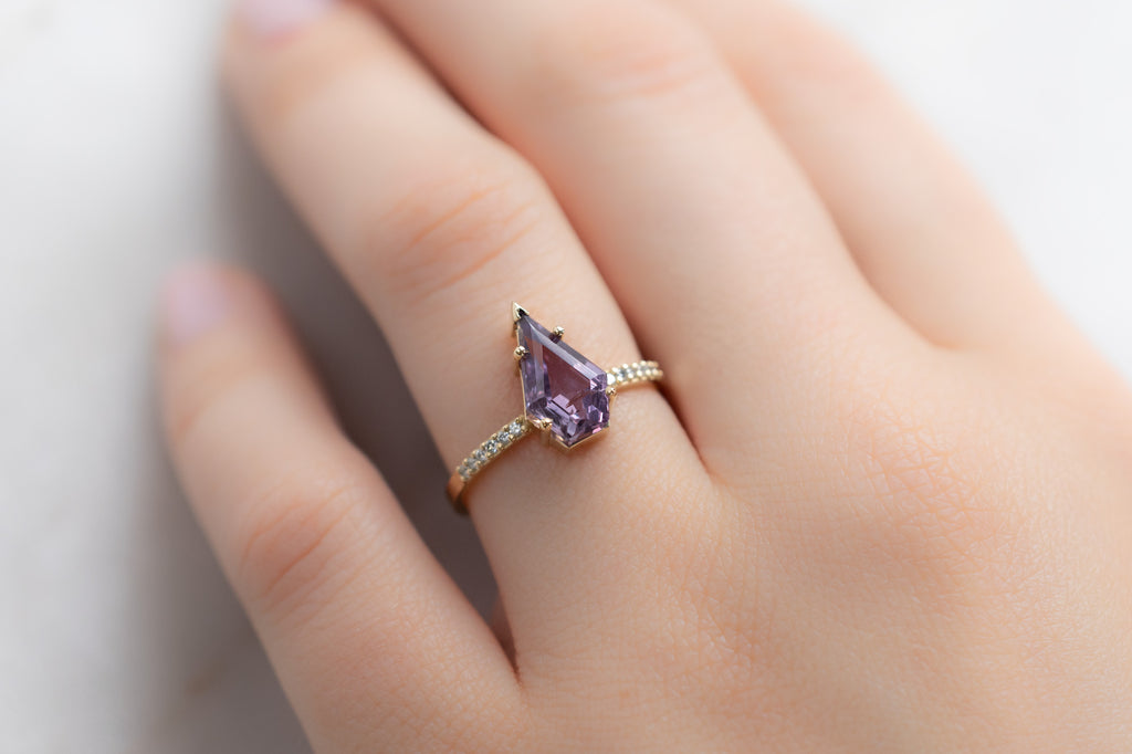 The Willow Ring with a Shield-Cut Violet Sapphire on Model