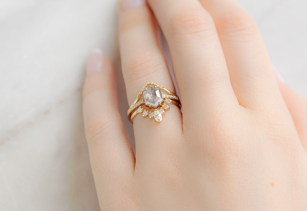 The Willow Ring with a Silvery Grey Hexagon Diamond with White Diamond Stacking Bands on Model