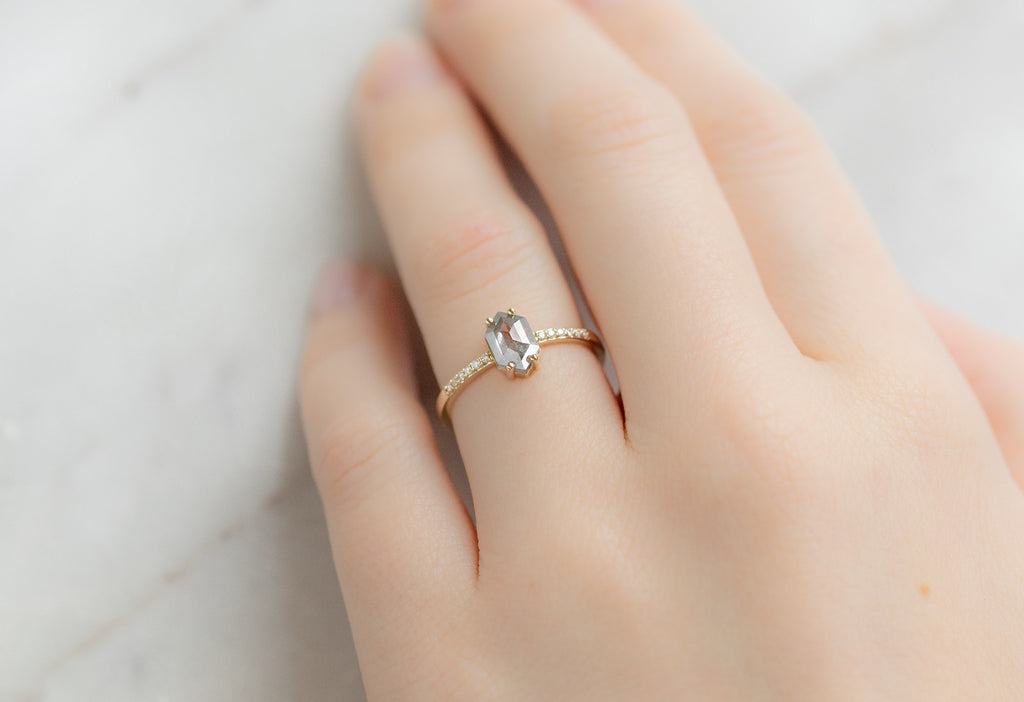 The Willow Ring with a Silvery Grey Hexagonal Diamond on Model