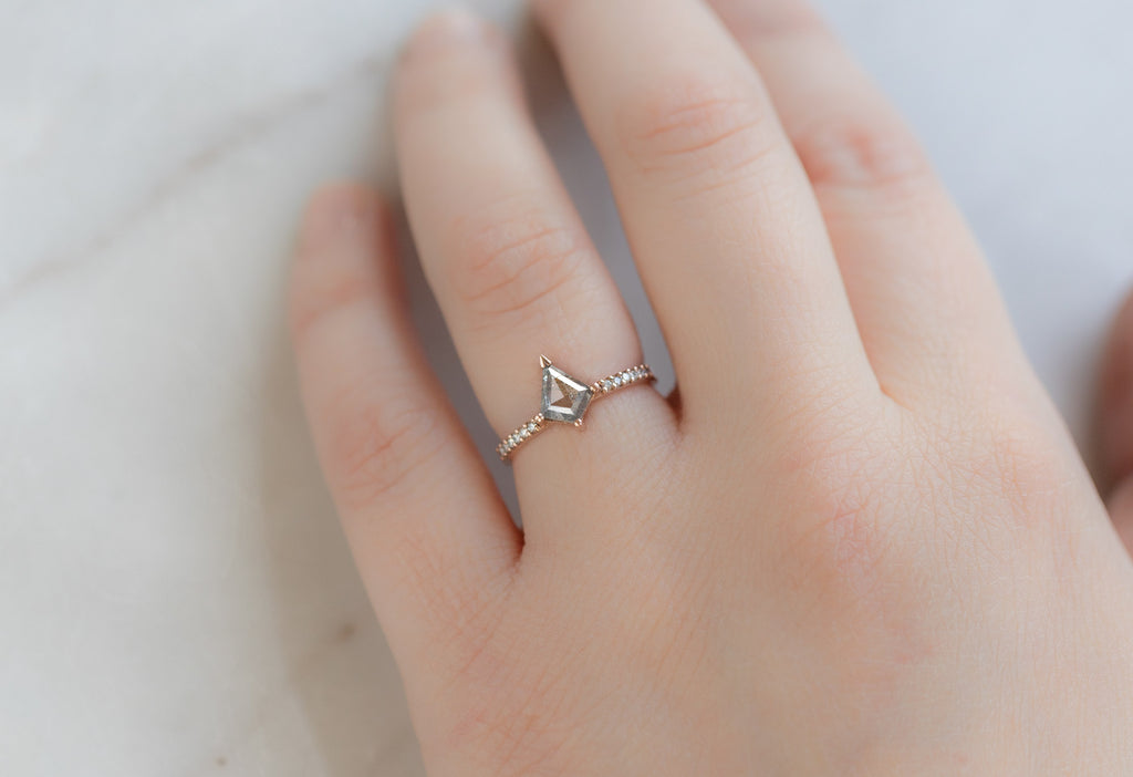 The Willow Ring with a Silvery Grey Kite Shaped Diamond on Model