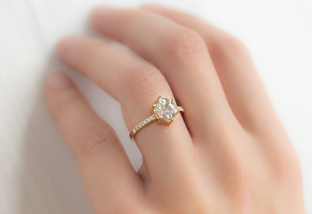 The Willow Ring with a White Sapphire Hexagon on Model