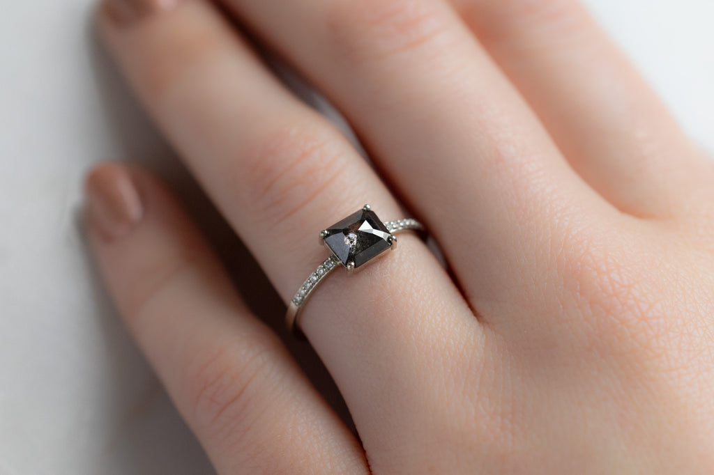 The Willow Ring with an Emerald-Cut Black Diamond on Model