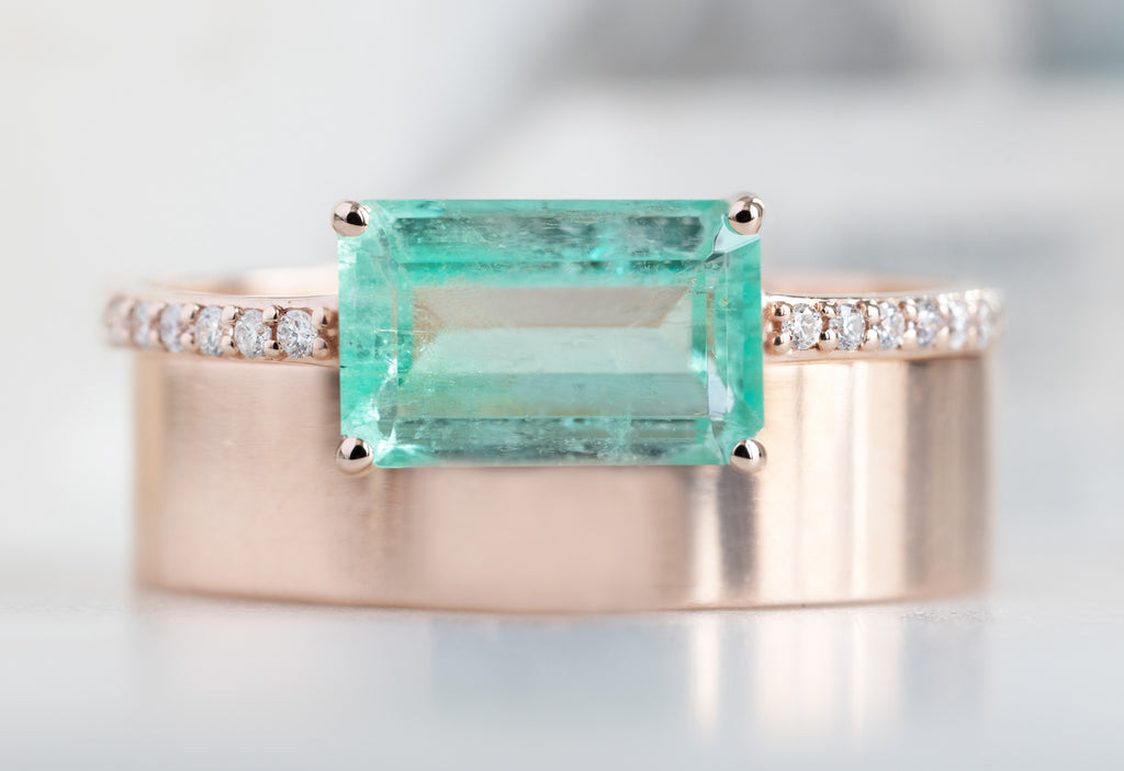 The Willow Ring with an Emerald Cut Emerald with Stacking Band