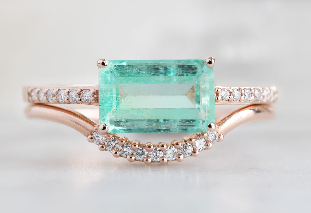 The Willow Ring with an Emerald Cut Emerald with Stacking Band