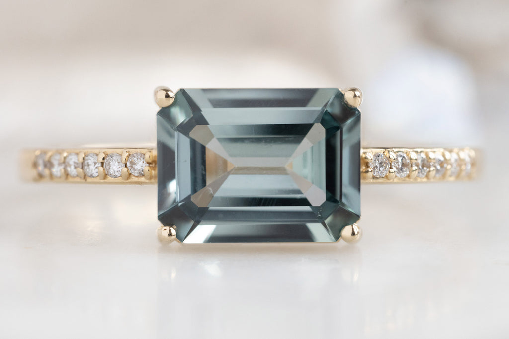 The Willow Ring with an Emerald-Cut Green Sapphire