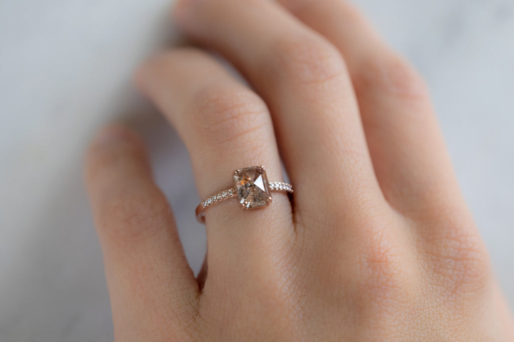 The Willow Ring with an Emerald-Cut Red Diamond on Model