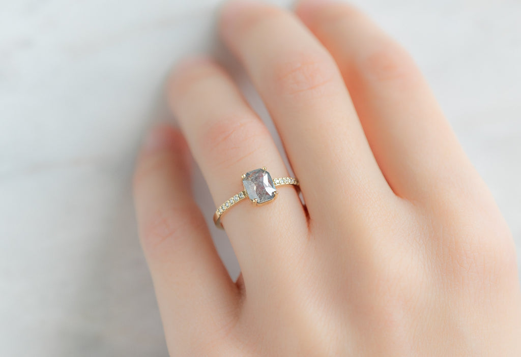 The Willow Ring with an Emerald-Cut Silvery Grey Diamond on Model