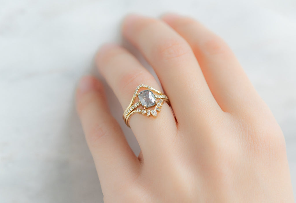 The Willow Ring with an Emerald-Cut Silvery Grey Diamond with White Diamond Stacking Bands on Model