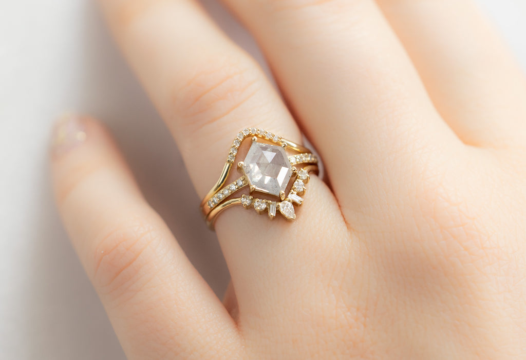 The Willow Ring with an Icy-White Hexagon Diamond with White Diamond Stacking Bands on Model