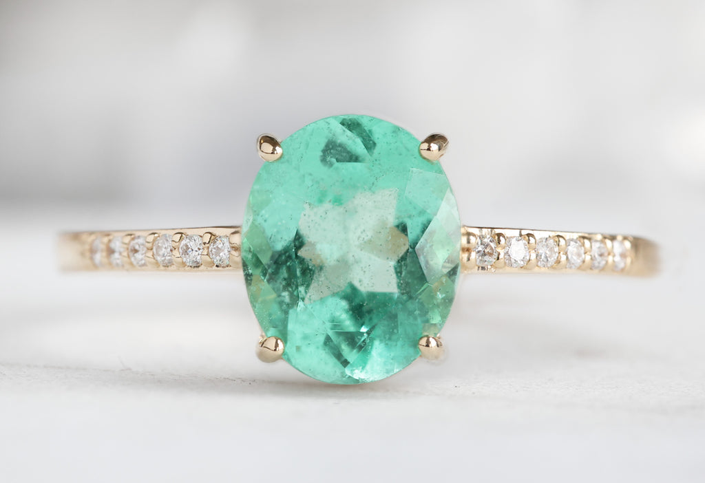 The Willow Ring with an Oval-Cut Emerald