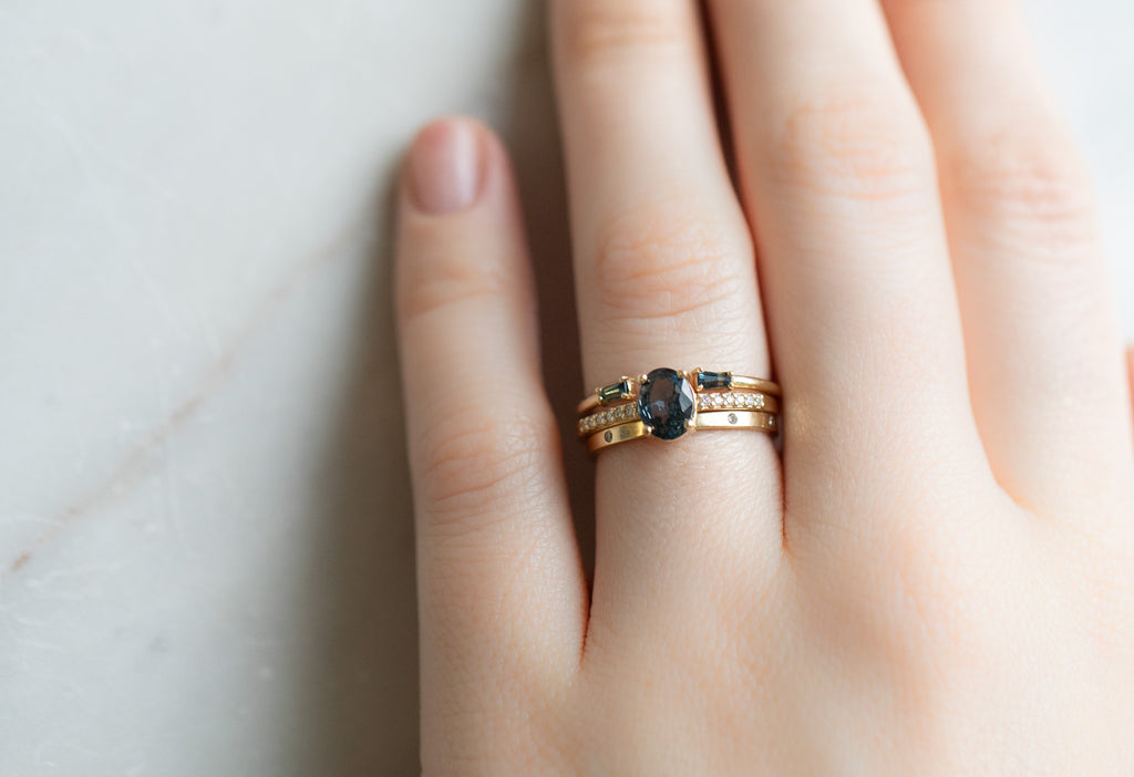 The Willow Ring with an Oval-Cut Spinel with Stacking Bands on Model