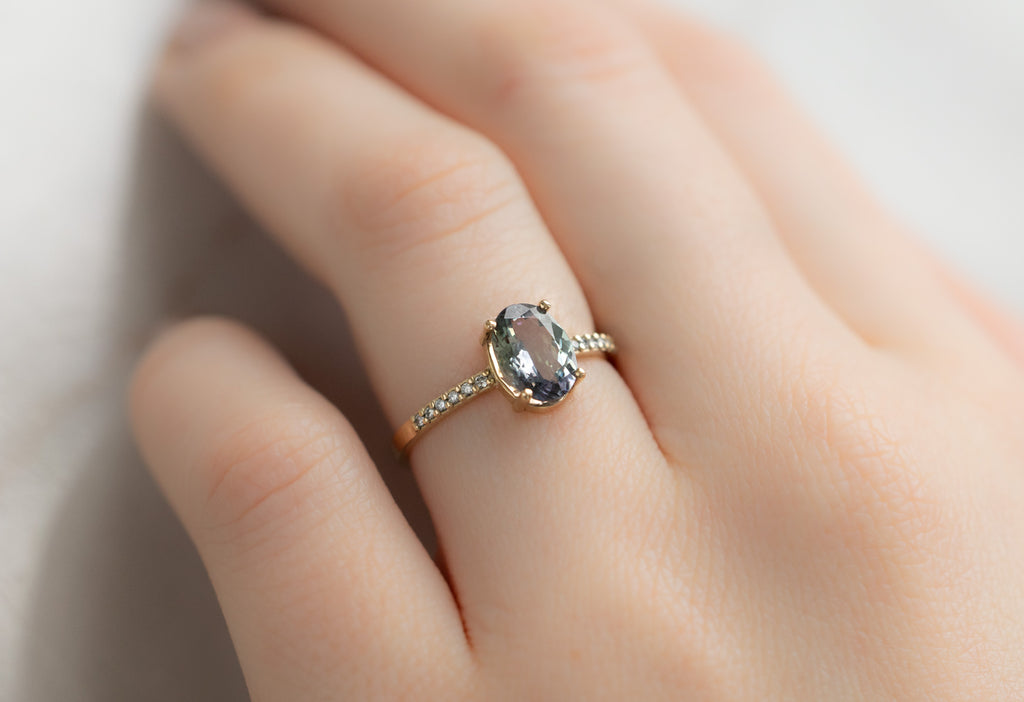 The Willow Ring with an Oval-Cut Tanzanite on Model