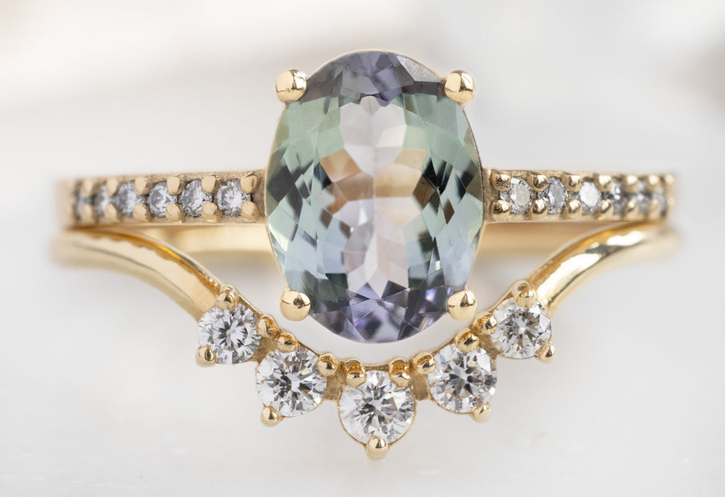 The Willow Ring with an Oval-Cut Tanzanite with Round Diamond Sunburst Stacking Band