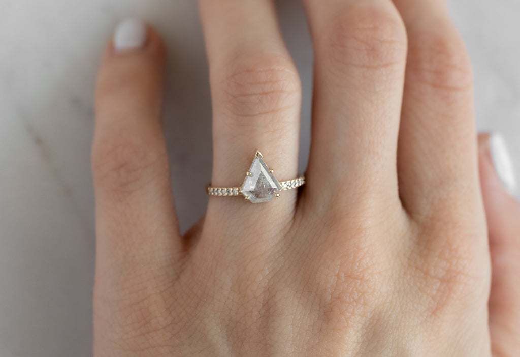 The Willow Ring with an Shield-Cut Icy-White Diamond on Model