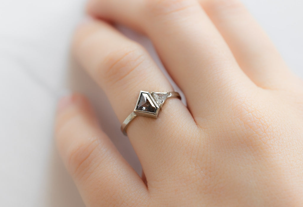 The You & Me Ring with a Black Shield + White Diamond on Model
