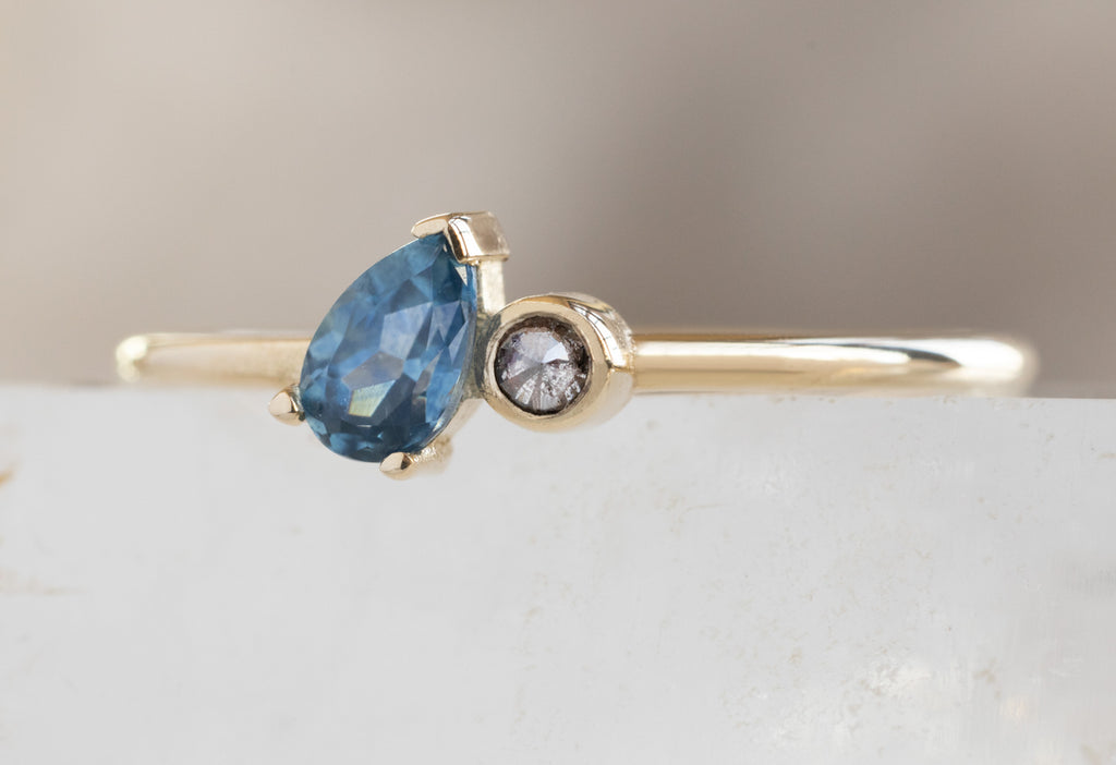 The You & Me Ring with a Montana Sapphire + Salt and Pepper Diamond