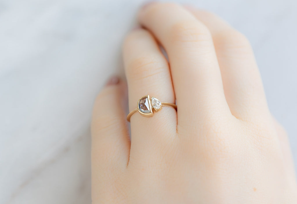 The You & Me Ring with a Silvery Grey Half Moon + White Diamond on Model