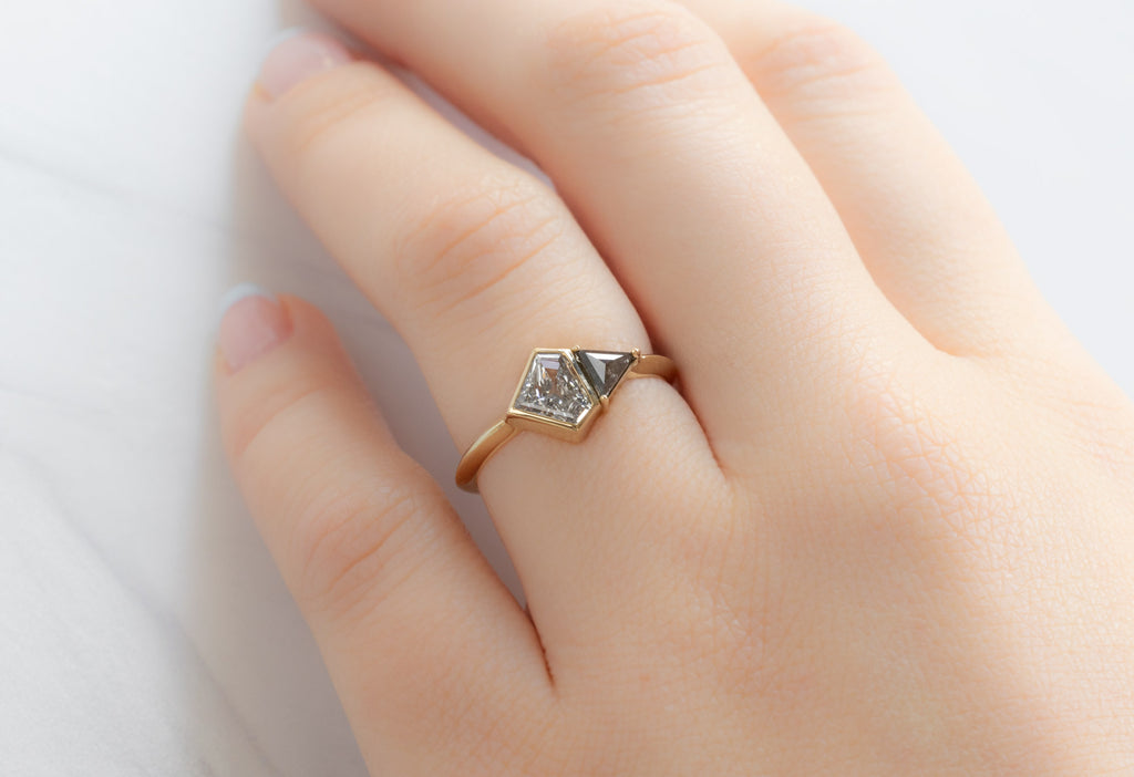 The You & Me Ring with a White Shield + Black Diamond on Model