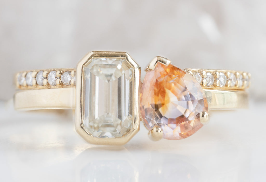 The You & Me Ring with an Emerald-Cut White Diamond + Bicolor Sapphire with Pavé Diamond Stacking Band