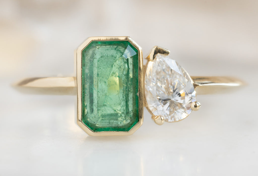 The You & Me Ring with an Emerald + White Diamond