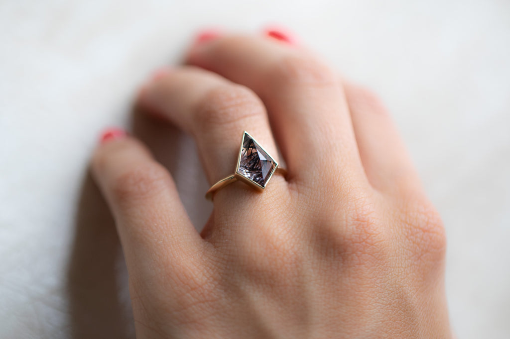 The Hazel Ring with a Kite-Shaped Tourmaline in Quartz on model