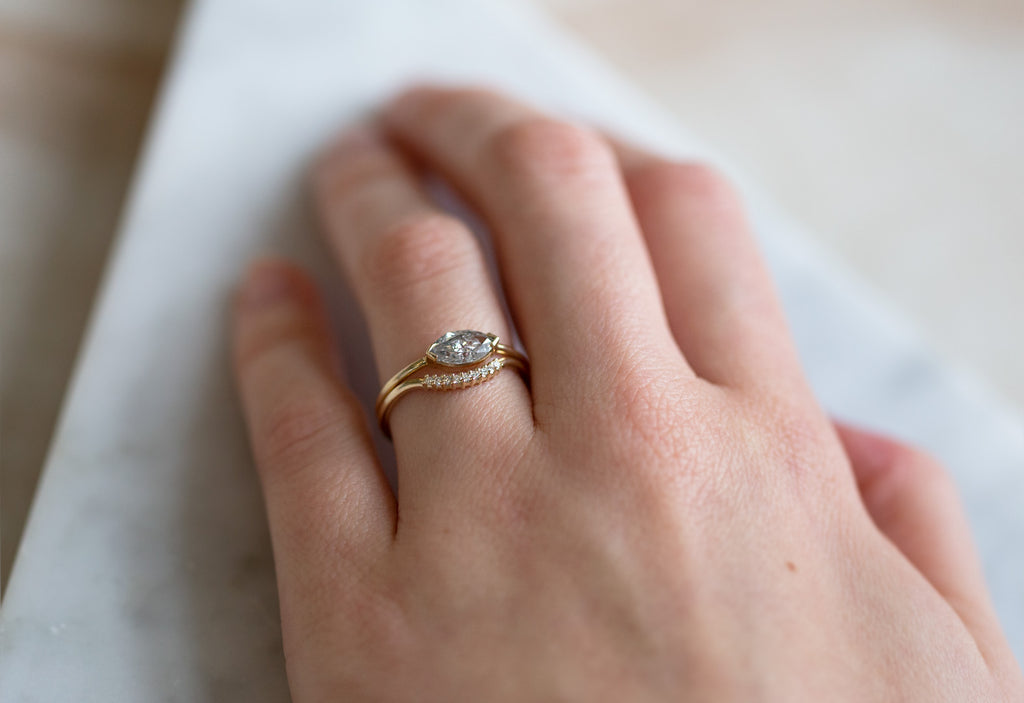 Yellow Gold Pavé Diamond Arc Stacking Ring Stacked with Diamond Engagement Ring on Model