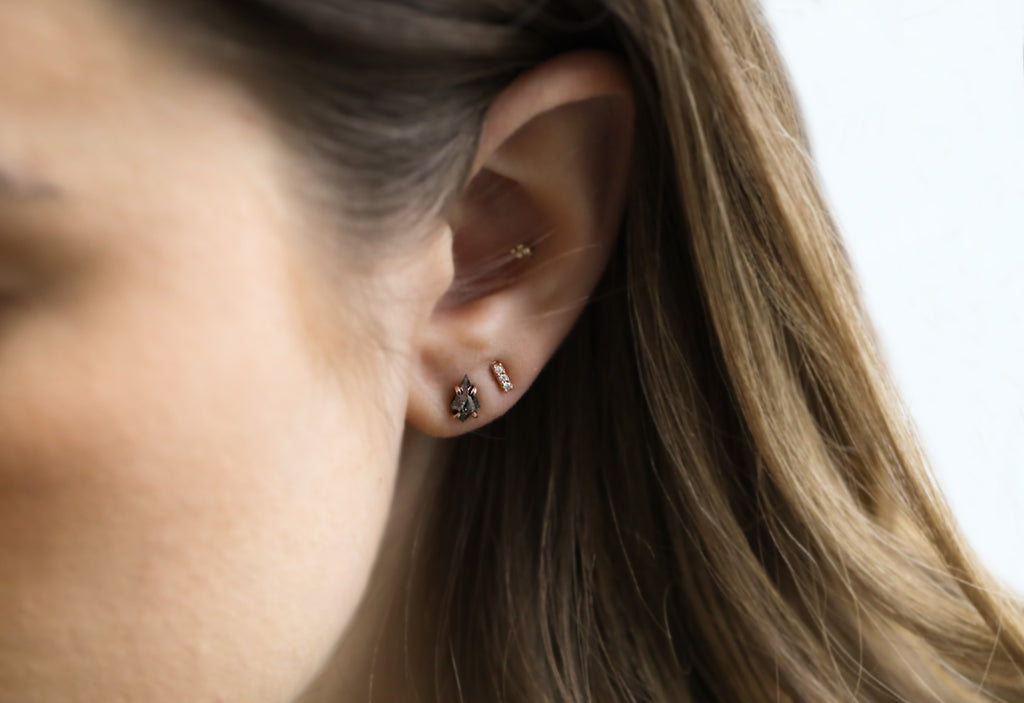 Teensy Diamond Bar Studs on Model