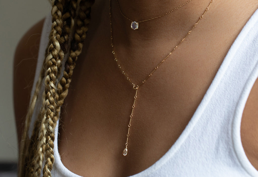yellow gold champagne briolette lariat necklace on model